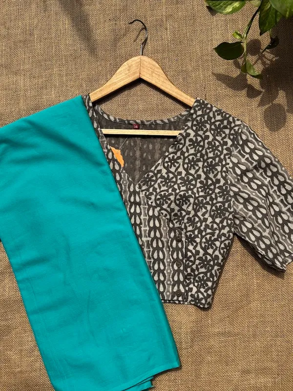 Aqua_Teal_Plain_Mulmul_Saree_with_Fabric_Tassels