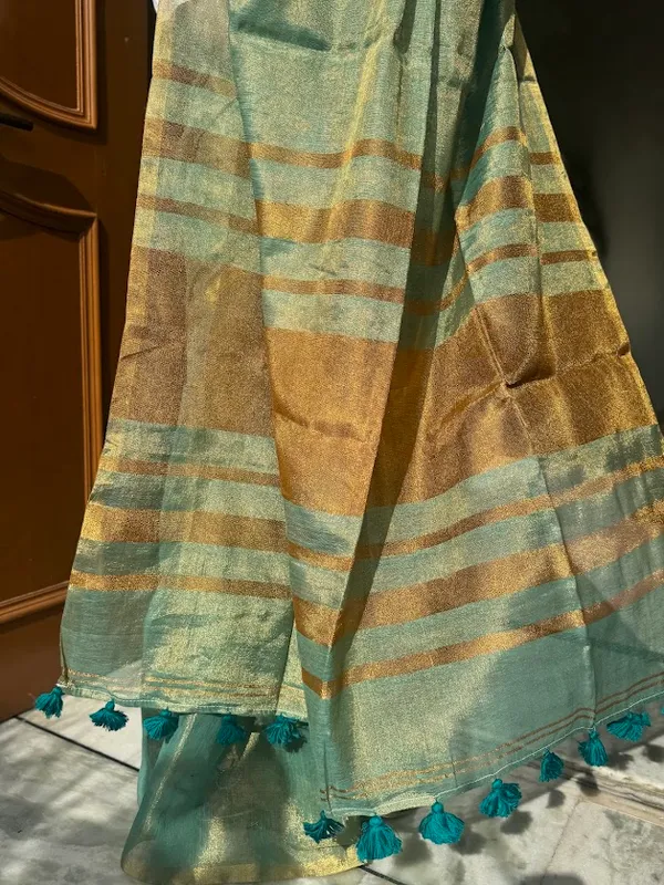 Ocenic_Ripple_:_Metallic_Tissue_Linen_Saree_with_thick_fabric_tassels