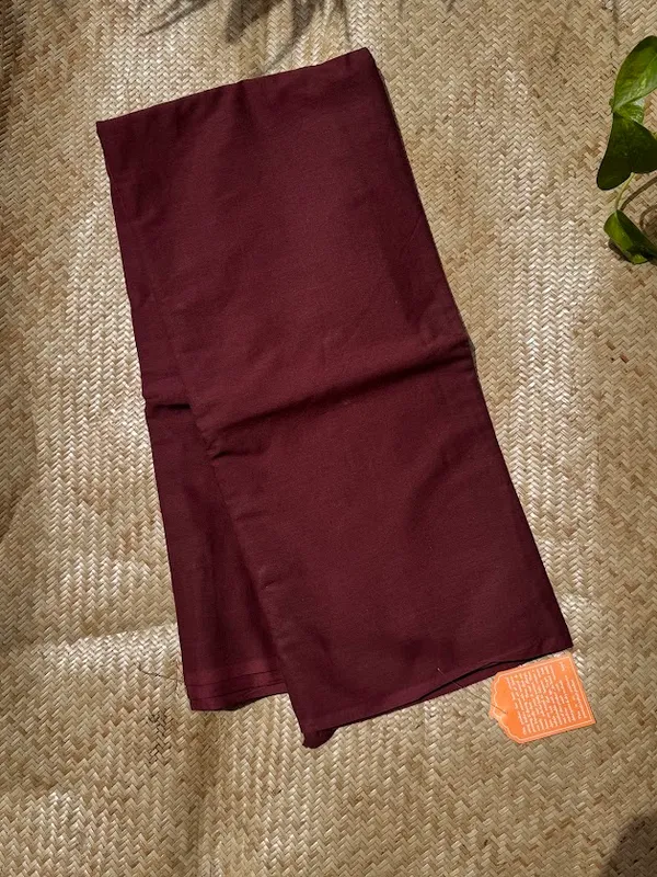 Dark_Maroon_Plain_Mulmul_Saree_with_Fabric_Tassels