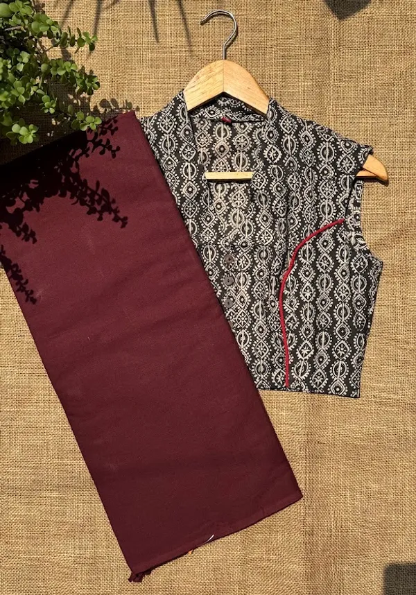 Dark_Maroon_Plain_Mulmul_Saree_with_Fabric_Tassels