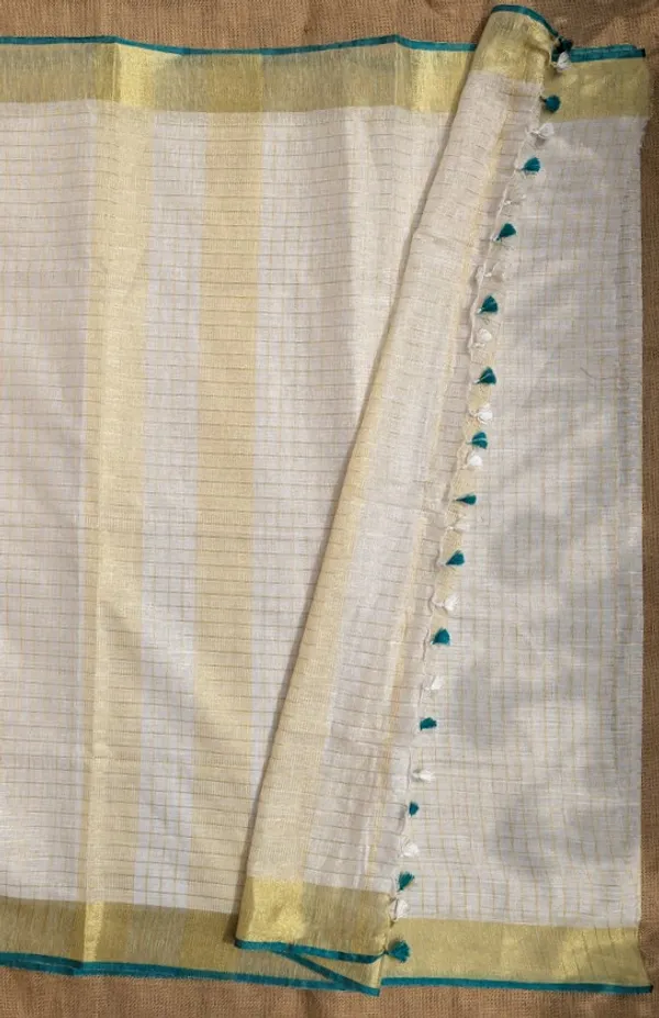 Onam_Linen_Zari_Saree_with_Rama_Green_Contrast_Blouse