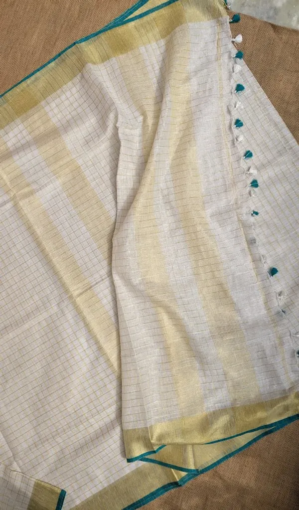 Onam_Linen_Zari_Saree_with_Rama_Green_Contrast_Blouse