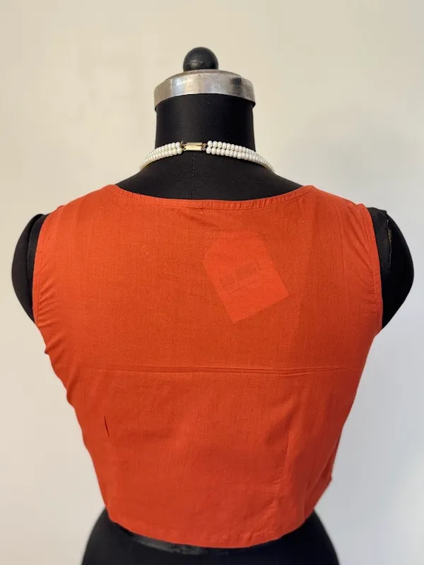 Rustic_-Orange_Sleeveless_Cotton_Blouse