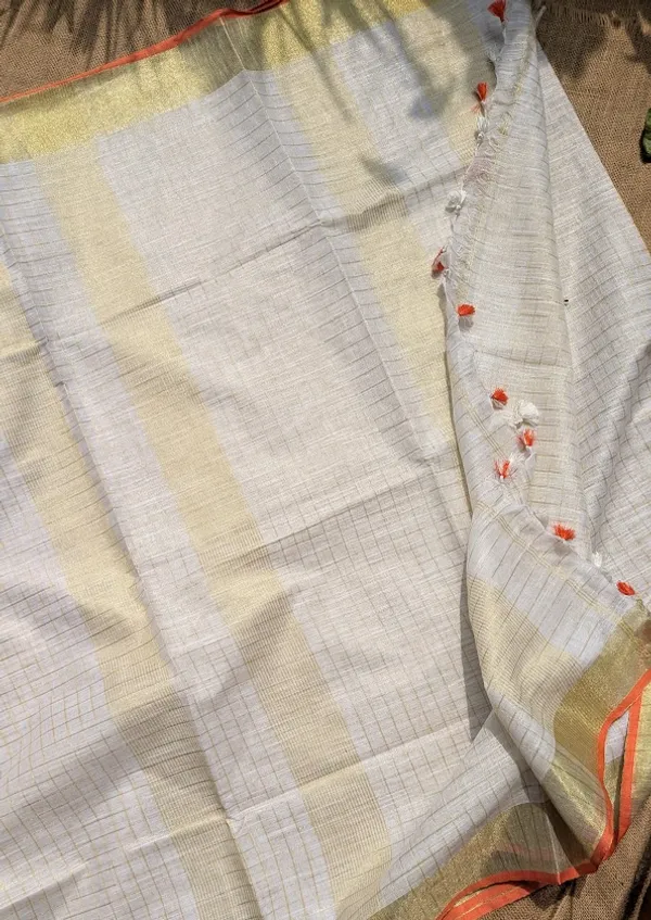 The_Onam_Aurora:_Off-White_Zari_Linen_Saree_with_Sunset_Orange_Blouse