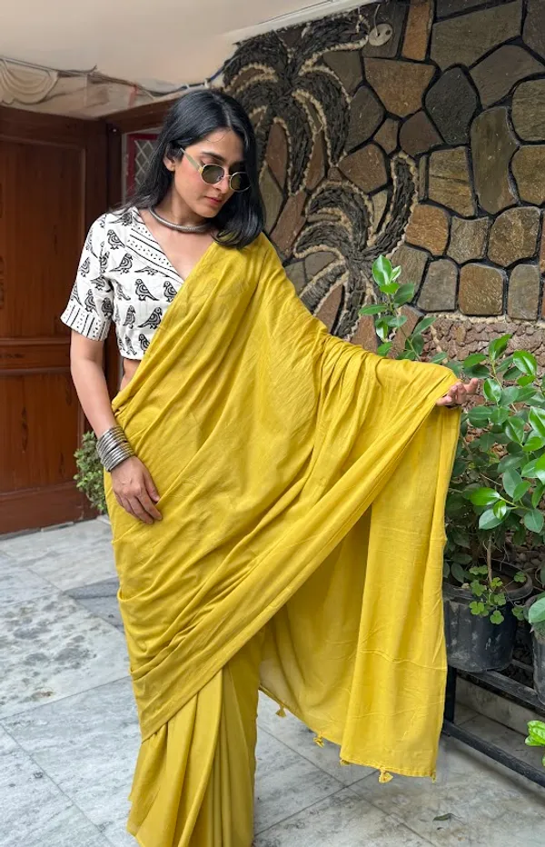 Mustard_Sun_Plain_Mulmul_Saree_with_Fabric_Tassels