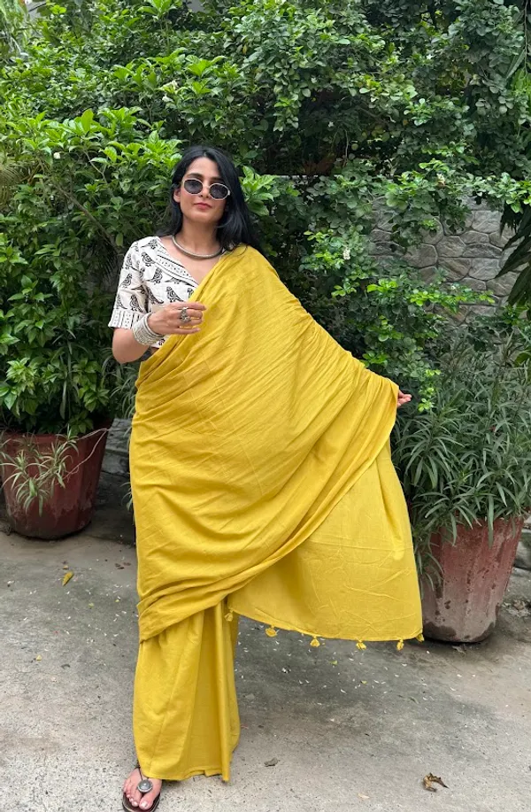 Mustard_Sun_Plain_Mulmul_Saree_with_Fabric_Tassels