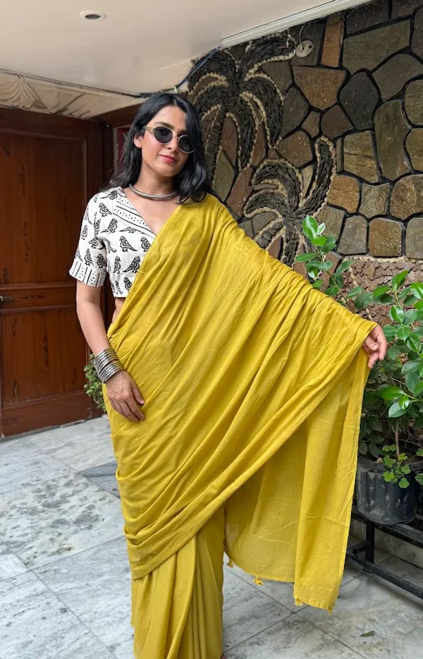 Mustard_Sun_Plain_Mulmul_Saree_with_Fabric_Tassels