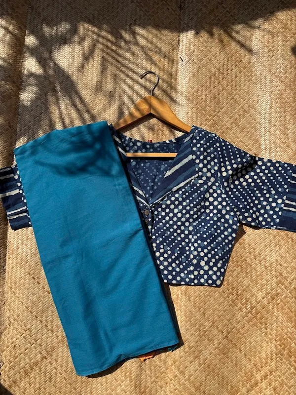 Capri_Blue_Plain_Mulmul_Saree_with_Fabric_Tassels