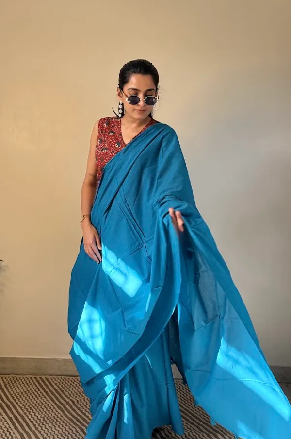 Capri_Blue_Plain_Mulmul_Saree_with_Fabric_Tassels