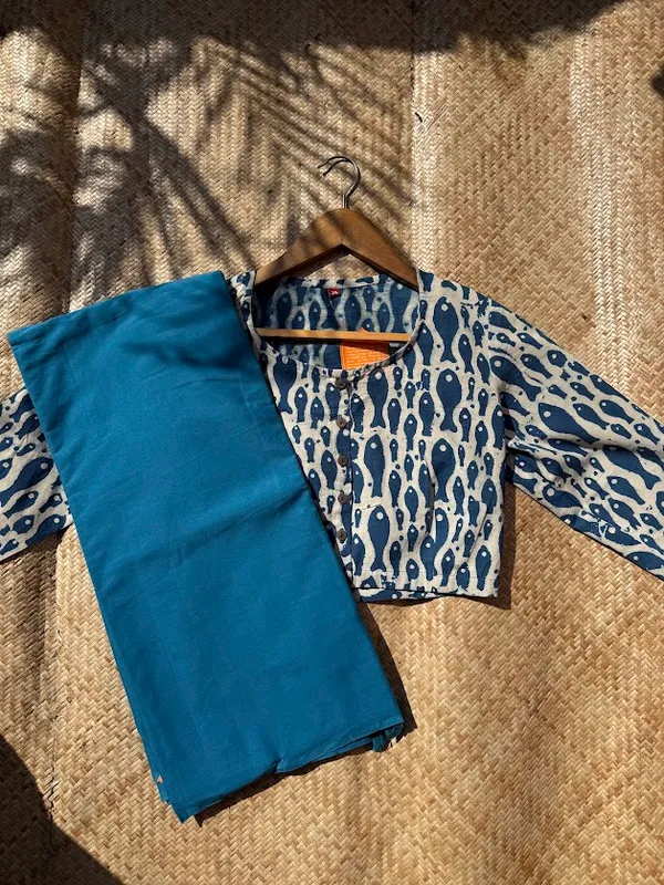 Capri_Blue_Plain_Mulmul_Saree_with_Fabric_Tassels