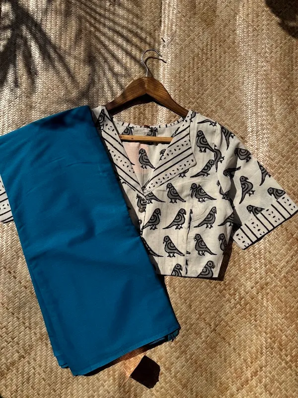 Capri_Blue_Plain_Mulmul_Saree_with_Fabric_Tassels