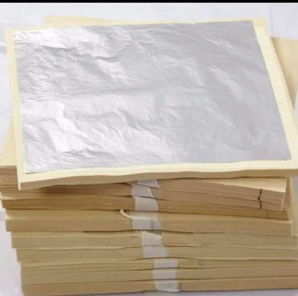 Pure_Silver_Leaves_99.9%_Pure_(Chandi_Ka_Vark)_For_Sweets,_Mithai,_Cakes_–_45_Sheets_(6X4_Inch)_Fssai_Certified_For_Indian_Sweets,_Bakery_&_Cosmetics