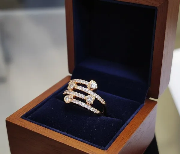 Viva_Jewels_Radiant_Rose_Gold-Plated_Multi-Layer_Spiral_Ring_–_Elegant_Triple-Band_Infinity_Ring_with_Quad-Heart_Zircon_Accents