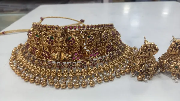 Viva_Jewels_Regal_Lakshmi_Temple_Choker_Set_–_Premium_Gold-Plated_Bridal_Necklace_with_Divine_Deity_Motifs,_Ruby-Red_Accents,_and_Traditional_Pearl_Fringes