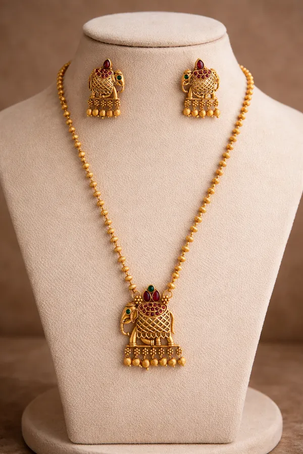 Viva_Jewels_Traditional_Gold-Plated_Elephant_Heritage_Pendant_Set_–_Handcrafted_Temple_Jewelry_Long_Chain_with_Ruby_&_Emerald_Accents