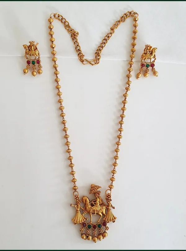 Viva_Jewels_Traditional_Gold-Plated_Matte_Finish_Temple_Jewelry_Set_–_Antique_Heritage_Pendant_with_Divine_Narrative_Artistry_and_Matching_Ethnic_Earrings