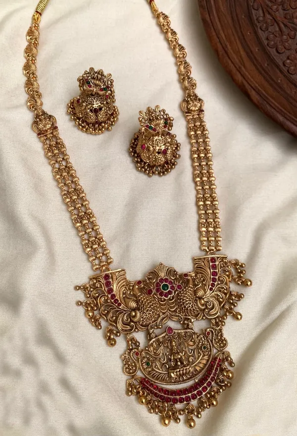 Viva_Jewels_Divine_Goddess_Lakshmi_Temple_Jewelry_Set_–_Antique_Gold-Plated_Long_Haram_Necklace_with_Intricate_Peacock_Motifs_and_Matching_Jhumka_Earrings