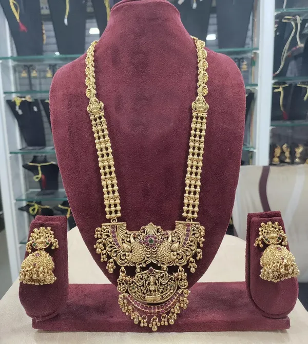 Viva_Jewels_Divine_Goddess_Lakshmi_Temple_Jewelry_Set_–_Antique_Gold-Plated_Long_Haram_Necklace_with_Intricate_Peacock_Motifs_and_Matching_Jhumka_Earrings