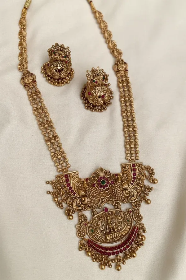 Viva_Jewels_Divine_Goddess_Lakshmi_Temple_Jewelry_Set_–_Antique_Gold-Plated_Long_Haram_Necklace_with_Intricate_Peacock_Motifs_and_Matching_Jhumka_Earrings