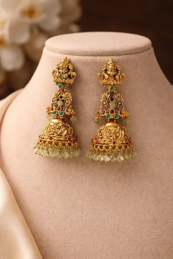 Viva_Jewels_Antique_Gold-Plated_Long_Temple_Jhumka_Earrings_–_Majestic_Goddess_Lakshmi_Motif_Tiered_Jhumkas_with_Floral_Carvings_and_Mint_Green_Bead_Droplets