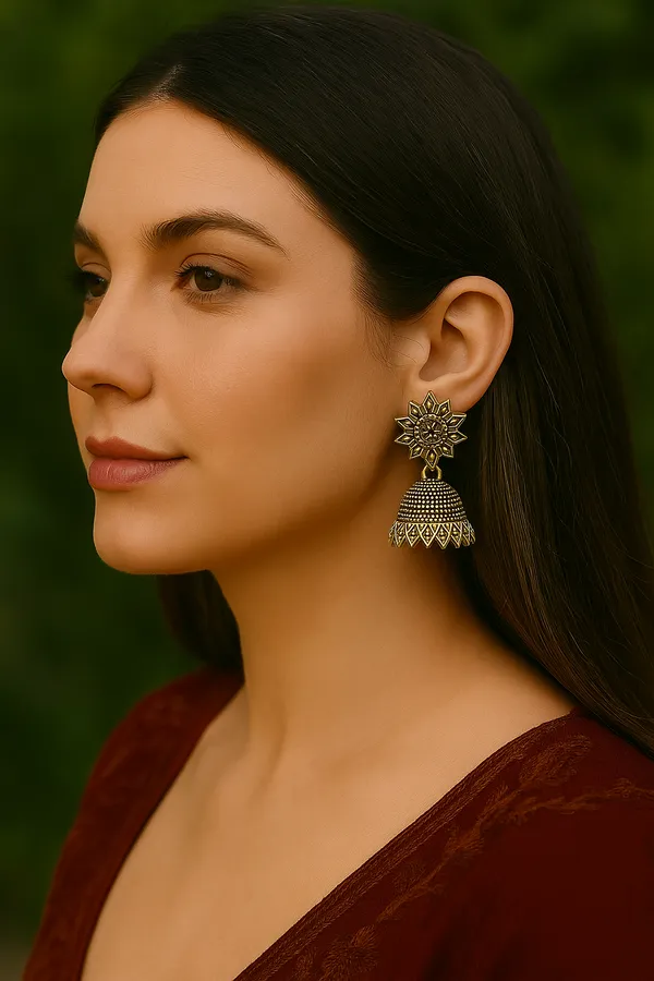 Viva_Jewels_Antique_Gold-Finish_"Surajmukhi"_Jhumkas_–_Traditional_Oxidized_Brass_Earrings_with_Intricate_Tribal_Patterns_and_Serrated_Edge_Detail
