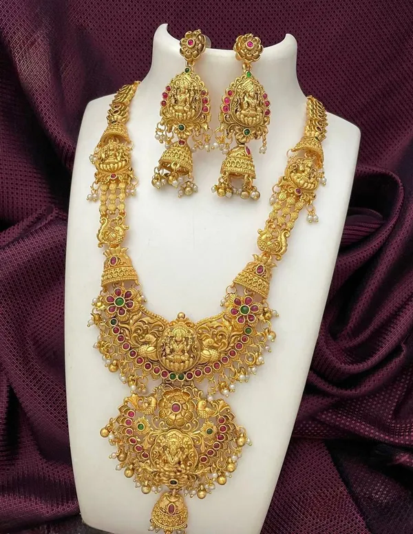 Viva_Jewels_Antique_Gold-Plated_Long_Temple_Haram_Set_–_Grand_Lakshmi_Motif_Bridal_Necklace_with_Matching_Jhumka_Earrings_and_Floral_Accents