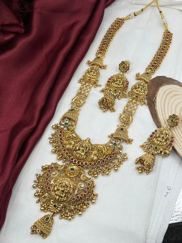 Viva_Jewels_Antique_Gold-Plated_Long_Temple_Haram_Set_–_Grand_Lakshmi_Motif_Bridal_Necklace_with_Matching_Jhumka_Earrings_and_Floral_Accents