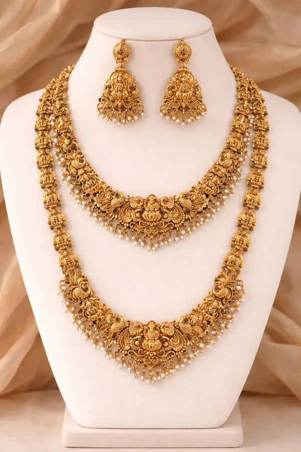 Viva_Jewels_Regal_Antique_Gold-Plated_Temple_Jewelry_Combo_Set_–_Divine_Lakshmi_&_Peacock_Motif_Long_Haram_and_Choker_Set_with_Matching_Jhumkas