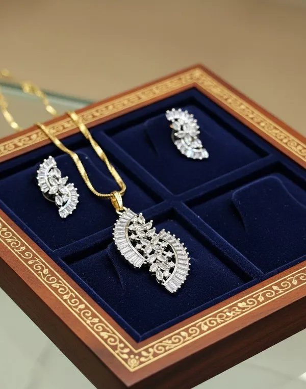 Viva_Jewels_Celestial_Shimmer_CZ_Pendant_Set_–_18K_Gold-Plated_S-Curve_Floral_Necklace_with_Baguette-Cut_Zirconia_and_Matching_Fan_Earrings