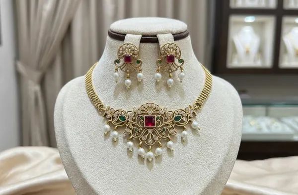 Royal_Antique-Finish_Mesh_Choker_Set_–_Traditional_Gold-Plated_Mesh_Necklace_with_Ruby_&_Emerald_Kemp_Accents_and_Pearl_Droplets