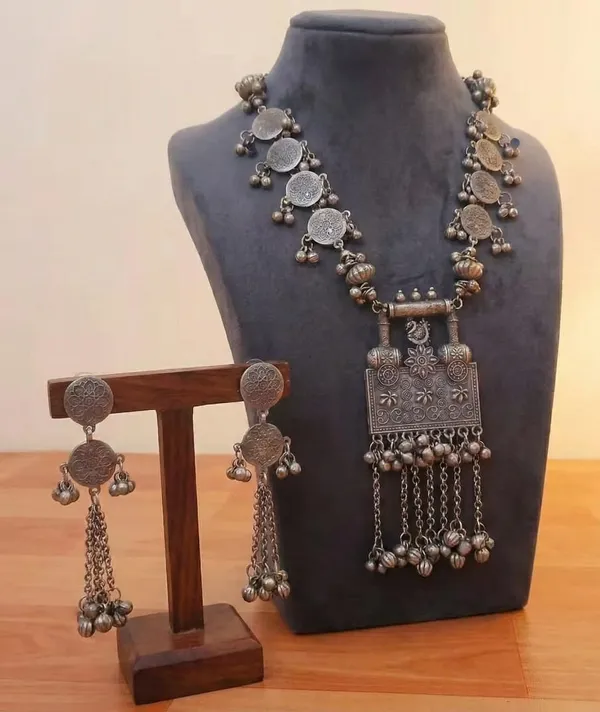 Viva_Jewels_Heritage_Silver_Oxidized_Long_Haar_Set_–_Tribal_Coin-Motif_Necklace_with_Intricate_Mirror-Work_Pendant_and_Synchronized_Drop_Earrings