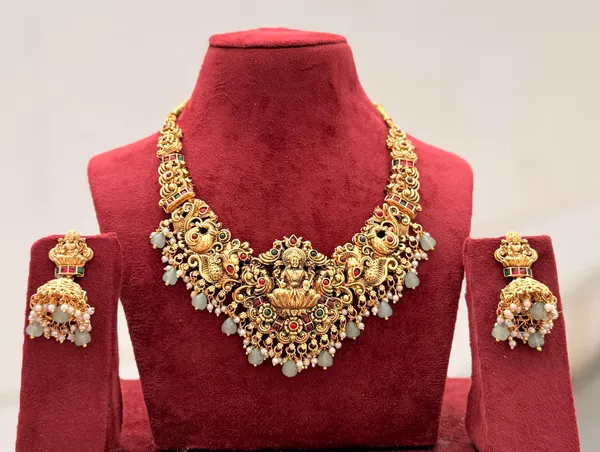 Viva_Jewels_Regal_Lakshmi_&_Peacock_Motif_Temple_Choker_–_Premium_Gold-Plated_Antique_Short_Necklace_with_Vibrant_Stonework_and_Mint_Bead_Droplets