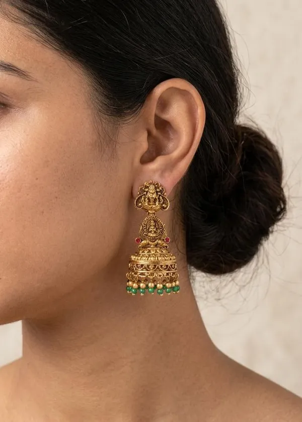 Viva_Jewels_Divine_Lakshmi_Temple_Jhumkas_–_Gold-Plated_Statement_Earrings_with_Traditional_Deity_Motif,_Ruby_Accents,_and_Emerald-Green_Bead_Fringe