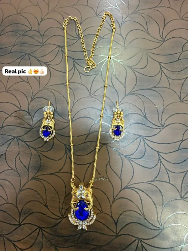 Viva_Jewels_Divine_Lord_Ganesha_Royal_Blue_Sapphire_Pendant_Chain_Set_–_Gold_Plated_CZ_Studded_Spiritual_Necklace_with_Matching_Earrings