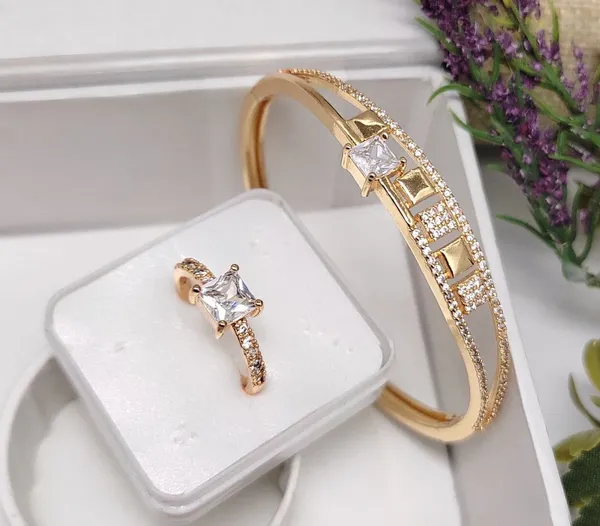 Viva_Jewels_Elegant_Gold-Plated_Minimalist_Geometric_Kada_Bracelet_&_Ring_Combo_Set_–_Sparkling_Princess-Cut_American_Diamond_Twist_Bangle_and_Matching_Solitaire_Ring_for_Contemporary,_Office_&_Party_Wear