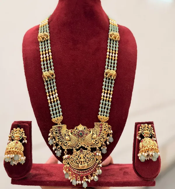 Viva_Jewels_Imperial_Temple_Heritage_Haar_–_Multi-Strand_Sage-Green_Beaded_Necklace_with_Grand_Peacock_&_Lakshmi_Pendant_and_Traditional_Elephant_Accents