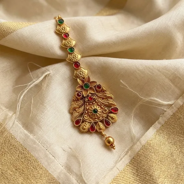Viva_Jewels_Ornate_Floral_Antique_Gold-Plated_Maang_Tikka_–_Heritage_Kemp_Stone_Forehead_Accessory_with_Embedded_Textured_Chain