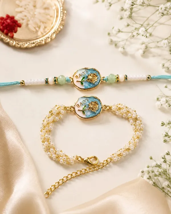 Viva_Jewels_Pastel_Rose_"LOVE"_Bhaiya_Bhabhi_Rakhi_Set_–_Handcrafted_Blue_&_Pink_Enamel_Rose_Rakhi_&_Multi-Strand_Pearl_Lumba_Set_with_Roli_Chaval_Jars