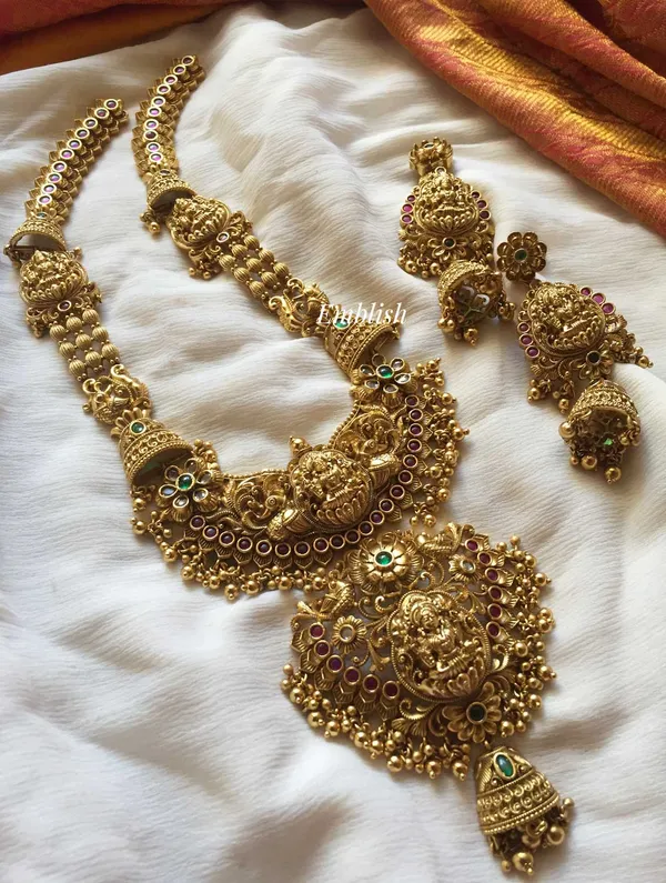 Viva_Jewels_Antique_Gold-Plated_Long_Temple_Haram_Set_–_Grand_Lakshmi_Motif_Bridal_Necklace_with_Matching_Jhumka_Earrings_and_Floral_Accents