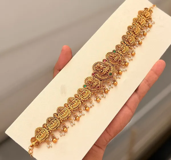 Viva_Jewels_Regal_Temple_Heritage_Vaddanam_–_Antique_Gold-Plated_Waist_Belt_featuring_Ashta_Lakshmi_Motifs,_Ruby_&_Emerald_Accents,_and_Delicate_Pearl_Droplets