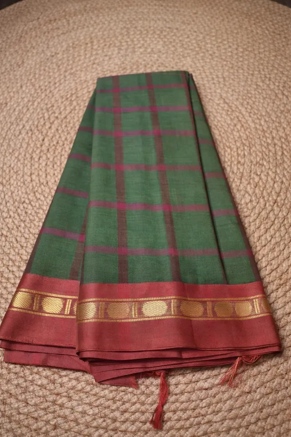 Dark_mehandi_with_maroon_border_pure_cotton_gadwala_saree_over_checks_dolor_design_border_saree