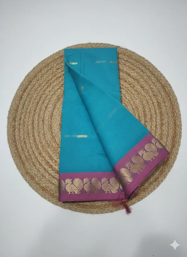 Teal_with_rani_pink_border_pure_cotton_saree.