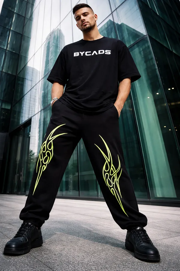 BYCADS_Neon_Tribal_Flame_Black_Joggers_–_Glow_Streetwear_Graphic_Lower