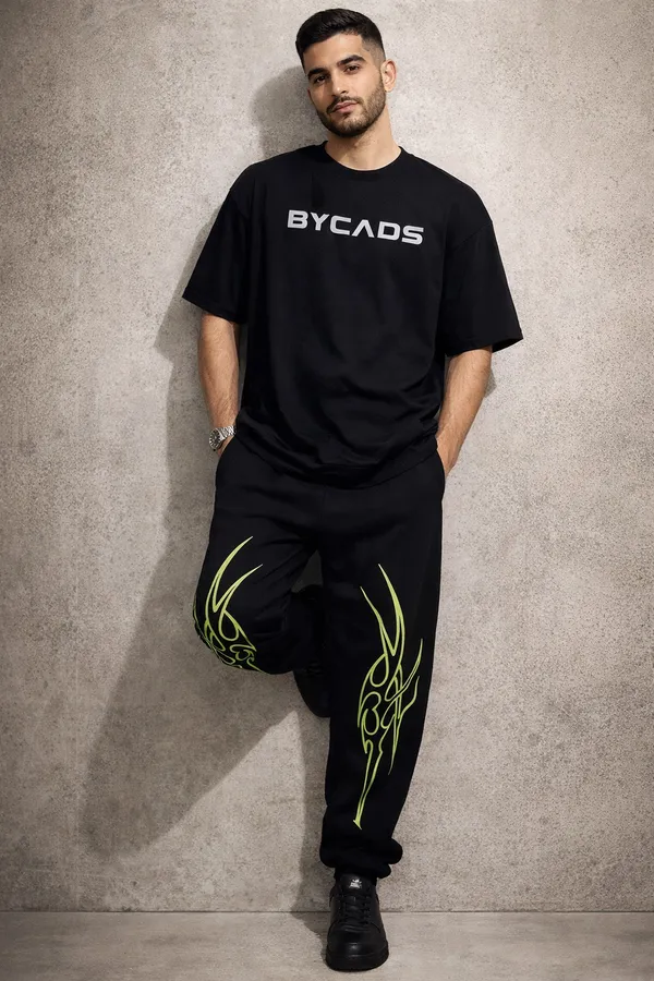 BYCADS_Neon_Tribal_Flame_Black_Joggers_–_Glow_Streetwear_Graphic_Lower