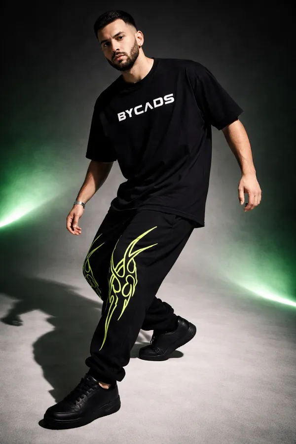 BYCADS_Neon_Tribal_Flame_Black_Joggers_–_Glow_Streetwear_Graphic_Lower