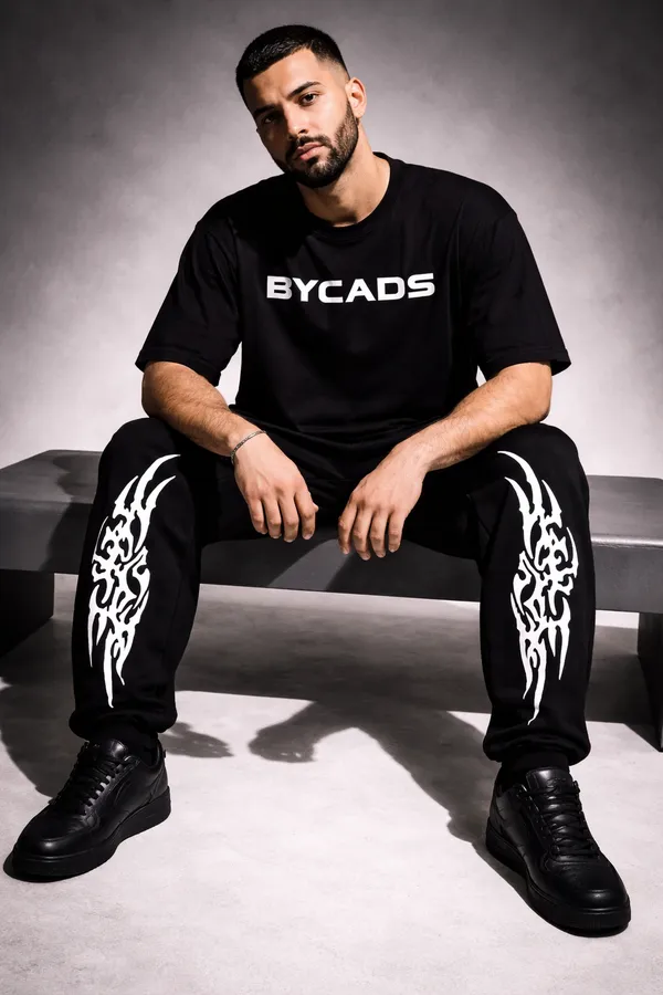 BYCADS_Tribal_Inferno_Graphic_Black_Joggers_–_Bold_Streetwear_Lower_Pants