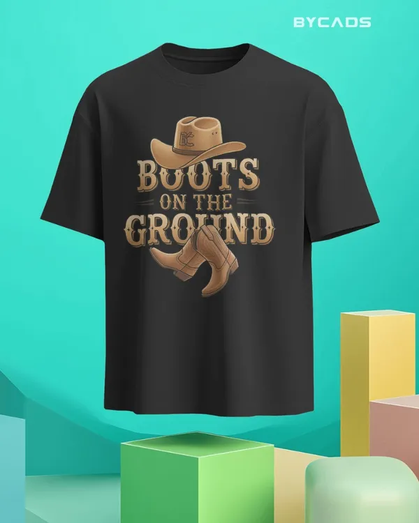 Black_Cotton_Boots_On_The_Ground_Oversized_Unisex_T-Shirt_|_Western_Graphic_Tee