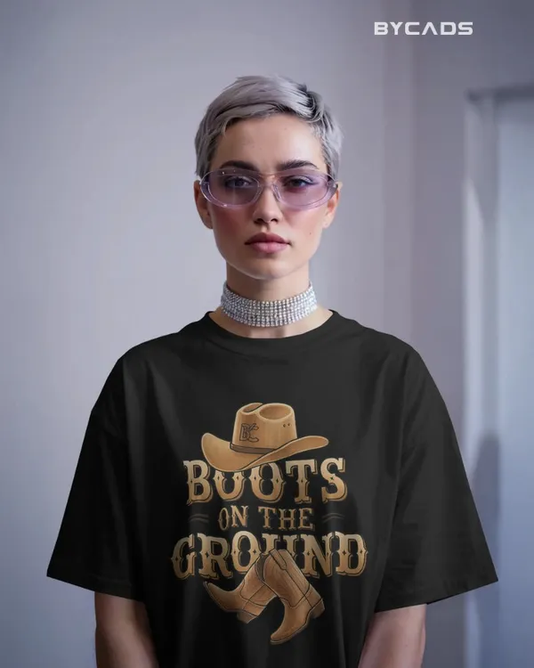 Black_Cotton_Boots_On_The_Ground_Oversized_Unisex_T-Shirt_|_Western_Graphic_Tee