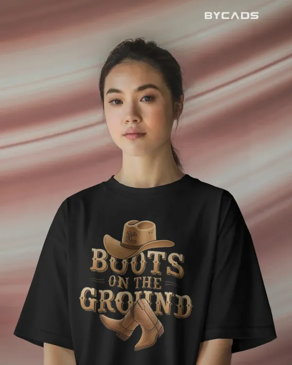 Black_Cotton_Boots_On_The_Ground_Oversized_Unisex_T-Shirt_|_Western_Graphic_Tee