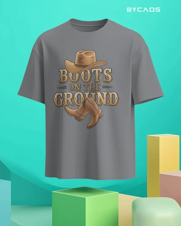 Grey_Cotton_Boots_On_The_Ground_Oversized_Unisex_T-Shirt_|_Western_Graphic_Tee
